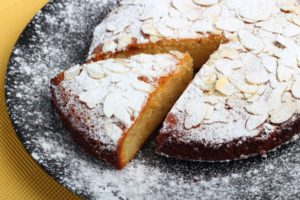 Almond torte with a slice cut out