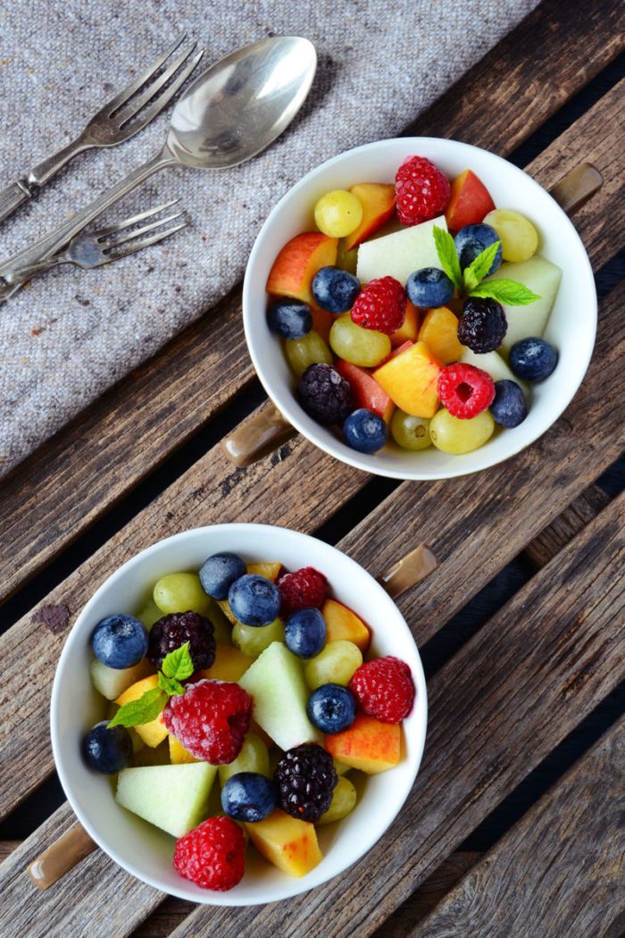 Freshly chopped fruit in bowls