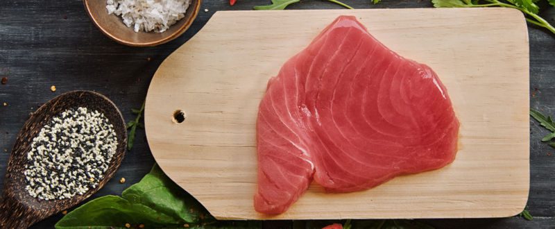Raw tuna fillet with greens and chillies